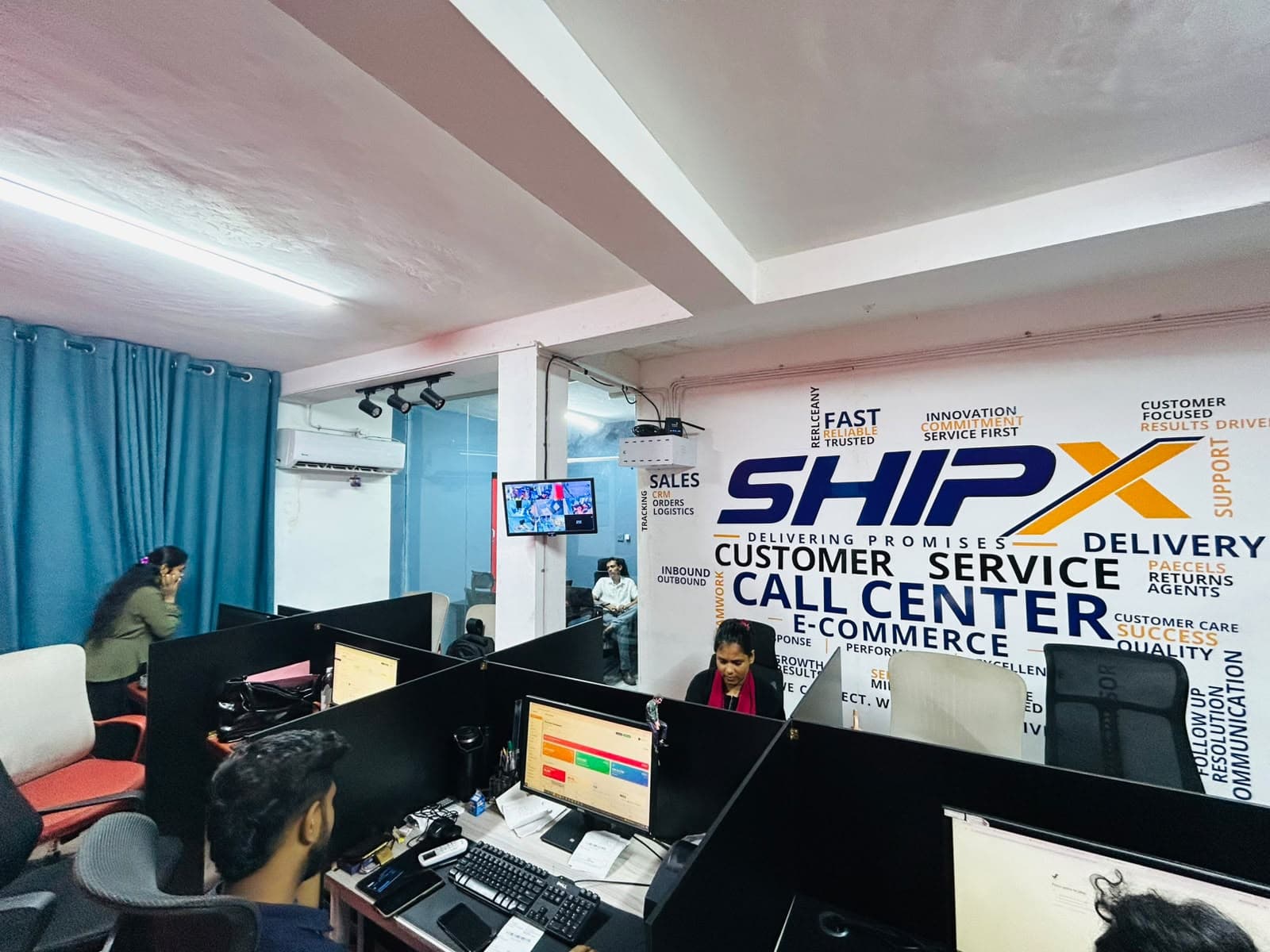 ShipX customer service and e-commerce call center team working on SellMate