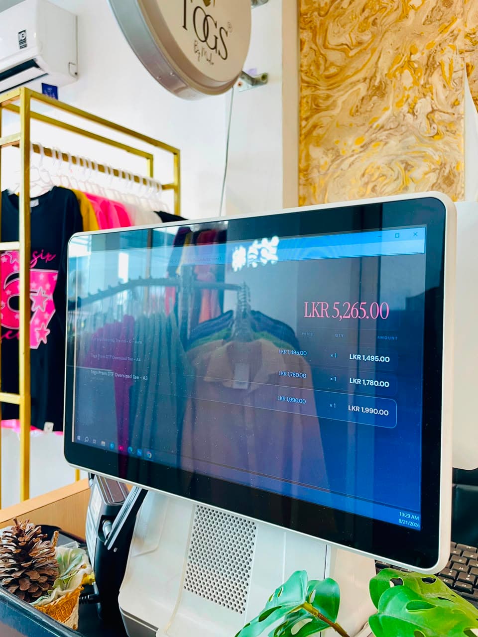 SellMate customer-facing display showing the bill total at Togs by Madio