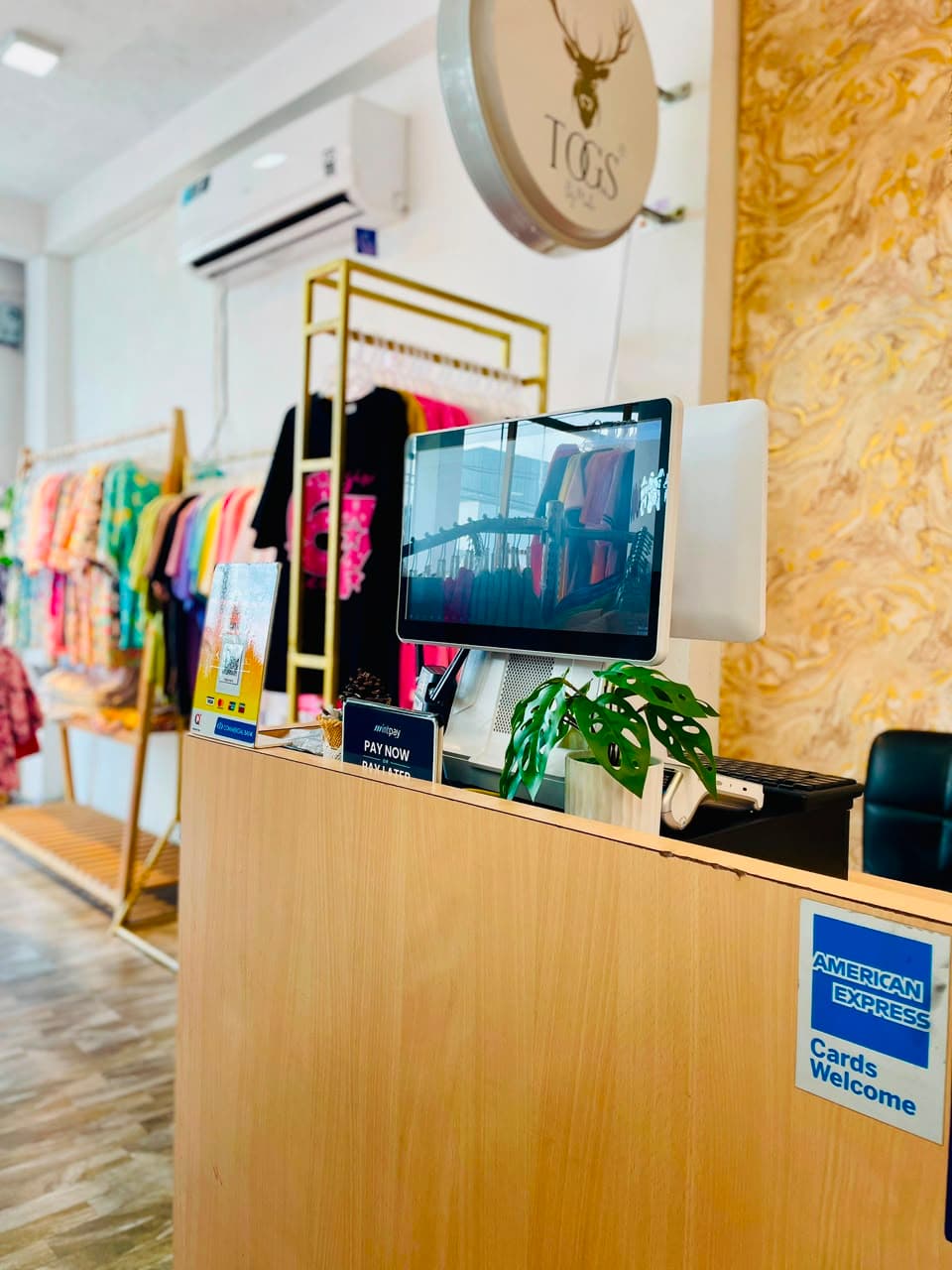 SellMate touchscreen POS at the Togs by Madio clothing boutique counter